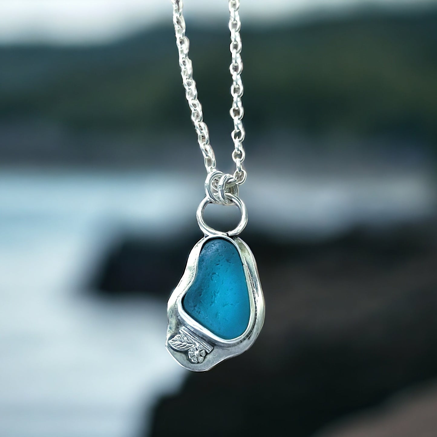 Teal Seaglass Necklace with leaf embillishment in Sterling Silver