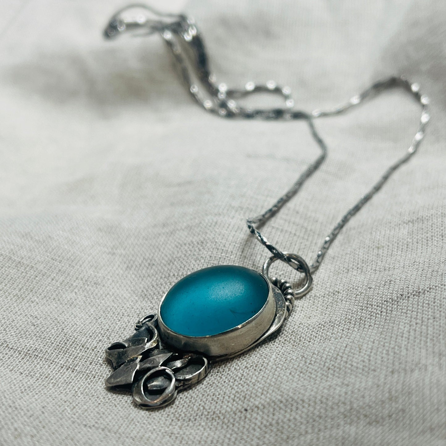 Freeform Waves: Turquoise Frosted Glass with Abstract Silver Detailing Pendant Necklace